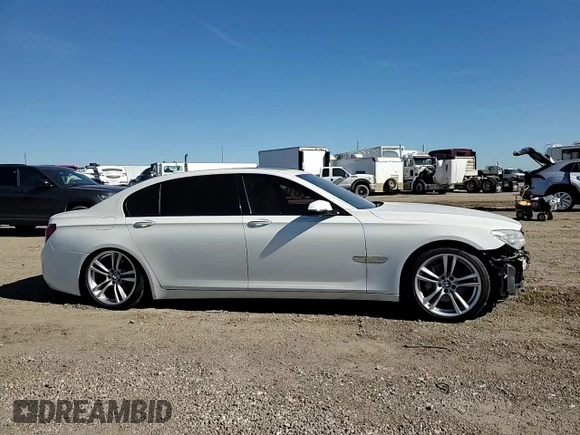 2014 BMW 7 Series 740Li with VIN WBAYE4C57ED138408, listed as a Copart auction lot 80553304 with 154,690 mi miles and Salvage Title. Bid and sale history available at carsss.com. Image 11.
