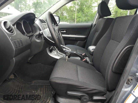 2008 Suzuki Grand Vitara w/Spare & Cargo Covers z VIN JS3TD941484103615, wystawiony jako Copart lot #56634065 z przebiegiem 82 420 mil mil oraz Szkody całkowita. Historia ofert i sprzedaży dostępna na DreamBid. Obrazek 7.