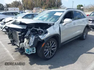 2020 Cadillac XT4 FWD Sport with VIN 1GYFZER46LF122716, listed as a IAAI auction lot 41905824 with 51,986 mi miles and . Bid and sale history available at carsss.com. Image 2.
