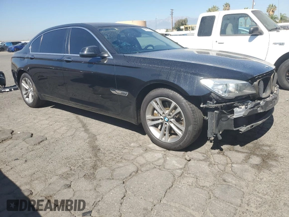 2015 BMW 7 Series 740Li with VIN WBAYE4C59FD947328, listed as a Copart auction lot 68987863 with 117,312 mi miles and . Bid and sale history available at DreamBid. Image 4.