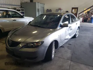 2006 Mazda Mazda3 i with VIN JM1BK12FX61465186, listed as a Copart auction lot 41385215 with 126,924 mi miles and Salvage Title. Bid and sale history available at carsss.com. Image 1.