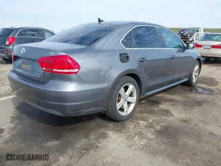 2012 Volkswagen Passat SE with VIN 1VWBP7A35CC024137, listed as a IAAI auction lot 41572782 with 138,827 mi miles. Bid and sale history available at carsss.com. Image 4.