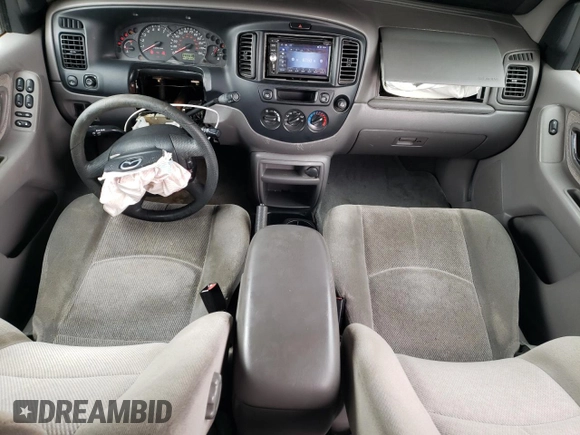 2002 Mazda Tribute LX with VIN 4F2CU08122KM01491, listed as a Copart auction lot 45290265 with 134,141 mi miles and Salvage Title. Bid and sale history available at carsss.com. Image 8.