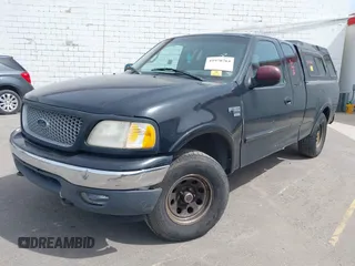 1999 Ford F-150 XL with VIN 1FTRX18L8XNB25526, listed as a IAAI auction lot 41970764 with 1 mi miles. Bid and sale history available at carsss.com. Image 2.