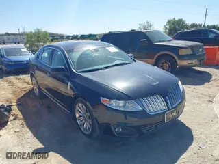 2009 Lincoln MKS with VIN 1LNHM94R39G625996, listed as a IAAI auction lot 41698785 with 99,696 mi miles. Bid and sale history available at carsss.com. Image 1.