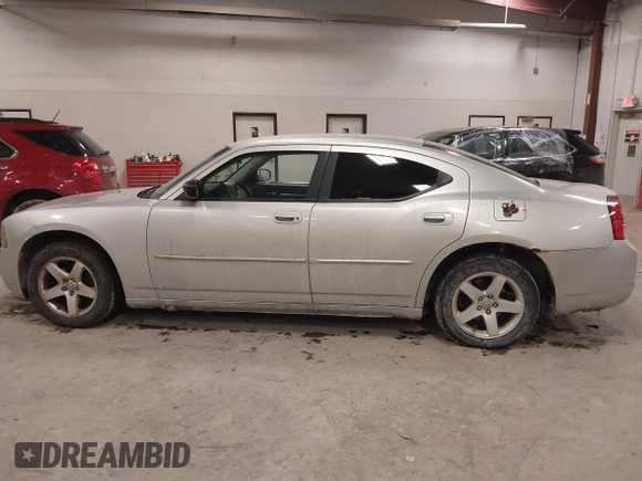 2009 Dodge Charger SE with VIN 2B3KA43V19H609614, listed as a IAAI auction lot 41515678 with 195,787 mi miles. Bid and sale history available at carsss.com. Image 14.