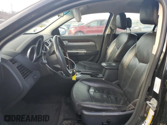 2010 Chrysler Sebring Limited with VIN 1C3CC5FB8AN176538, listed as a Copart auction lot 42290724 with 140,569 mi miles and Salvage Title. Bid and sale history available at DreamBid. Image 7.