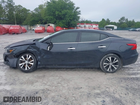 2016 Nissan Maxima Platinum with VIN 1N4AA6AP9GC408480, listed as a IAAI auction lot 42383732 with 145,412 mi miles and . Bid and sale history available at DreamBid. Image 14.