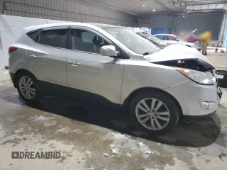 2010 Hyundai Tucson GLS with VIN KM8JU3AC7AU102873, listed as a Copart auction lot 54472385 with 108,853 mi miles and Non Repairable. Bid and sale history available at DreamBid. Image 4.