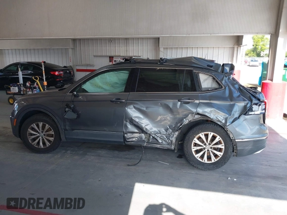 2018 Volkswagen Tiguan SEL with VIN 3VV3B7AXXJM213579, listed as a IAAI auction lot 42664339 with 84,676 mi miles and . Bid and sale history available at DreamBid. Image 14.