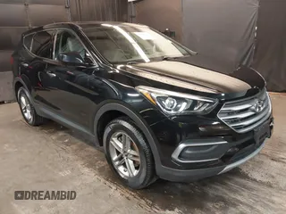 2018 Hyundai Santa Fe 2.4L z VIN 5NMZTDLB6JH099587, wystawiony jako IAAI lot #42428425 z przebiegiem 46 789 mil mil oraz . Historia ofert i sprzedaży dostępna na DreamBid. Obrazek 1.