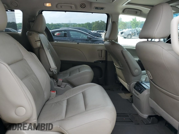 2016 Toyota Sienna XLE with VIN 5TDYK3DC3GS730639, listed as a Copart auction lot 57379935 with 105,323 mi miles and Salvage title. Bid and sale history available at DreamBid. Image 11.