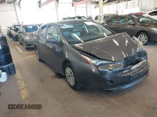 2016 Toyota Prius Two z VIN JTDKBRFU8G3021284, wystawiony jako IAAI lot #42018712 z przebiegiem 123 237 mil mil oraz . Historia ofert i sprzedaży dostępna na DreamBid. Obrazek 1.