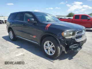 2013 Dodge Durango SXT with VIN 1C4RDJAG3DC575923, listed as a Copart auction lot 60100195 with 211,606 mi miles and Salvage title. Bid and sale history available at DreamBid. Image 4.