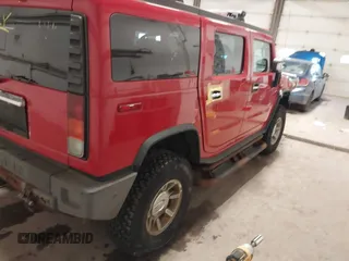 2004 Hummer H2 with VIN 5GRGN23U24H114730, listed as a IAAI auction lot 41605451 with 122,658 mi miles. Bid and sale history available at carsss.com. Image 4.