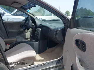 1999 Saturn SW z VIN 1G8ZK8270XZ189484, wystawiony jako IAAI lot #42265580 z przebiegiem 142 257 mil mil oraz . Historia ofert i sprzedaży dostępna na DreamBid. Obrazek 5.