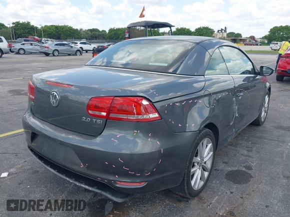 2014 Volkswagen Eos Sport with VIN WVWBW8AH2EV000313, listed as a IAAI auction lot 42333112 with 106,125 mi miles and . Bid and sale history available at DreamBid. Image 6.