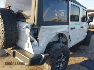 2022 Jeep Wrangler Unlimited Rubicon with VIN 1C4HJXFN4NW123803, listed as a IAAI auction lot 40994742 with 36,156 mi miles and . Bid and sale history available at DreamBid. Image 6.