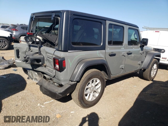 2023 Jeep Wrangler Sport with VIN 1C4HJXDN1PW701944, listed as a Copart auction lot 69973104 with 24,733 mi miles and Salvage Title. Bid and sale history available at DreamBid. Image 3.