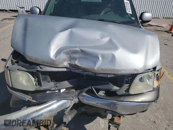 2003 Ford F-150 XLT with VIN 1FTRW08L03KD74119, listed as a Copart auction lot 47373105 with 303,513 mi miles and Salvage Title. Bid and sale history available at carsss.com. Image 13.