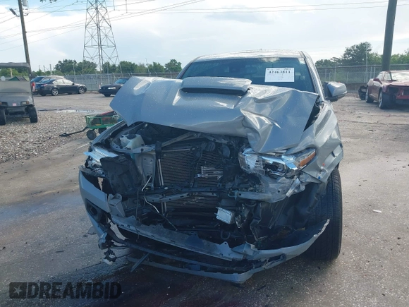 2020 Toyota Tacoma SR5 with VIN 3TMDZ5BN3LM080702, listed as a IAAI auction lot 42463811 with 70,185 mi miles and . Bid and sale history available at DreamBid. Image 6.