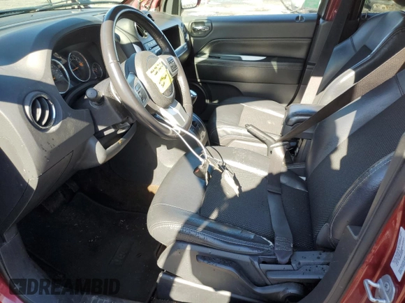 2016 Jeep Compass Latitude z VIN 1C4NJCEA4GD619757, wystawiony jako Copart lot #52113325 z przebiegiem 98 912 mil mil oraz Szkoda całkowita • Salvage title. Historia ofert i sprzedaży dostępna na DreamBid. Obrazek 7.