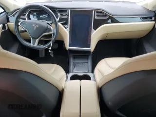 2014 Tesla Model S 60 with VIN 5YJSA1H14EFP34335, listed as a Copart auction lot 65504325 with Not provided miles and Clean title. Bid and sale history available at DreamBid. Image 8.