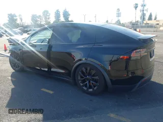 2023 Tesla Model X with VIN 7SAXCDE59PF430836, listed as a IAAI auction lot 41545267 with Not Provided miles and . Bid and sale history available at DreamBid. Image 3.