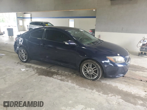 2010 Scion tC z VIN JTKDE3B71A0307041, wystawiony jako Copart lot #58983495 z przebiegiem 144 056 mil mil oraz Czysty tytuł • Clean title. Historia ofert i sprzedaży dostępna na DreamBid. Obrazek 4.