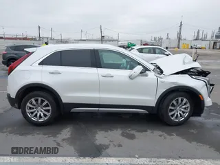 2022 Cadillac XT4 FWD Premium Luxury with VIN 1GYFZCR49NF100393, listed as a IAAI auction lot 42497187 with 23,672 mi miles and . Bid and sale history available at DreamBid. Image 13.