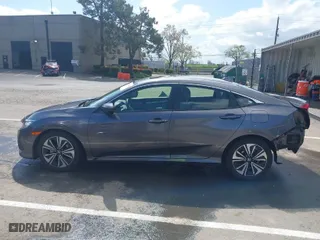 2018 Honda Civic Sedan EX-T with VIN JHMFC1F30JX018885, listed as a IAAI auction lot 41905534 with 94,560 mi miles. Bid and sale history available at carsss.com. Image 15.