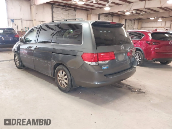 2010 Honda Odyssey EX-L with VIN 5FNRL3H7XAB080170, listed as a IAAI auction lot 41241879 with 221,272 mi miles. Bid and sale history available at carsss.com. Image 3.