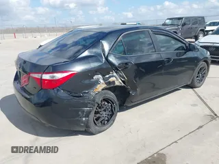 2015 Toyota Corolla L with VIN 5YFBURHE3FP307047, listed as a IAAI auction lot 41525250 with 181,605 mi miles and . Bid and sale history available at DreamBid. Image 4.