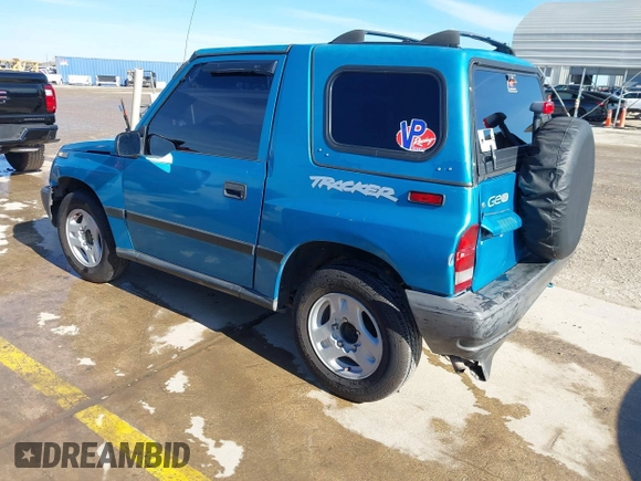 1997 Chevrolet Tracker z VIN 2CNBE1865V6904672, wystawiony jako IAAI lot #41296166 z przebiegiem 266 743 mil mil oraz . Historia ofert i sprzedaży dostępna na DreamBid. Obrazek 3.