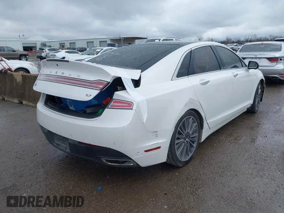 2014 Lincoln MKZ with VIN 3LN6L2GK2ER804677, listed as a IAAI auction lot 41553543 with 123,661 mi miles. Bid and sale history available at carsss.com. Image 4.