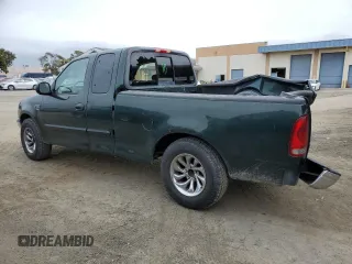 2003 Ford F-150 XL with VIN 1FTRX17L73KA47012, listed as a Copart auction lot 47410495 with 206,967 mi miles and Salvage title. Bid and sale history available at DreamBid. Image 2.