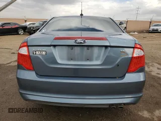 2012 Ford Fusion SE with VIN 3FAHP0HA2CR124891, listed as a Copart auction lot 76113714 with 184,628 mi miles and Salvage title. Bid and sale history available at DreamBid. Image 6.