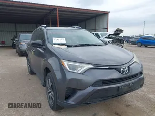 2016 Toyota RAV4 LE with VIN JTMZFREV5GJ098557, listed as a IAAI auction lot 41853782 with 106,923 mi miles and . Bid and sale history available at DreamBid. Image 1.