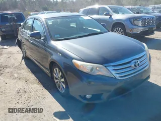 2011 Toyota Avalon with VIN 4T1BK3DBXBU381959, listed as a IAAI auction lot 42029923 with 150,028 mi miles and . Bid and sale history available at carsss.com. Image 1.