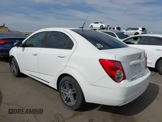 2013 Chevrolet Sonic LS with VIN 1G1JA5SH9D4249356, listed as a IAAI auction lot 42373352 with 151,337 mi miles and . Bid and sale history available at DreamBid. Image 3.