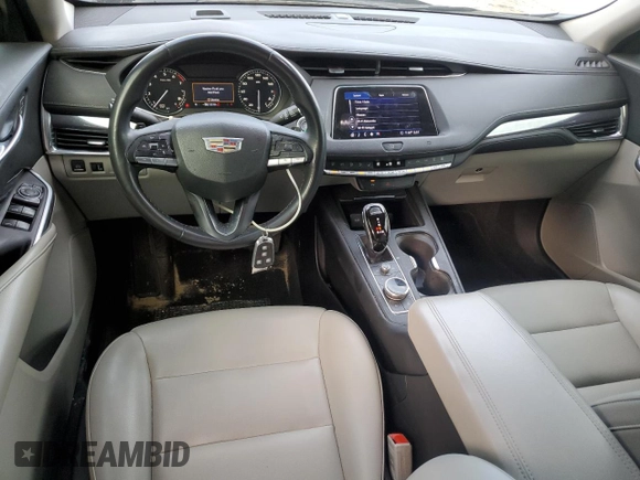 2020 Cadillac XT4 FWD Luxury with VIN 1GYAZAR47LF142704, listed as a Copart auction lot 86730714 with 122,356 mi miles and Salvage Title. Bid and sale history available at DreamBid. Image 8.