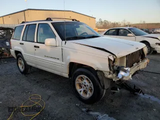 1996 Jeep Grand Cherokee z VIN 1J4FX78S6TC221815, wystawiony jako Copart lot #44000615 z przebiegiem 287 308 mil mil oraz Szkoda całkowita • Salvage title. Historia ofert i sprzedaży dostępna na DreamBid. Obrazek 4.