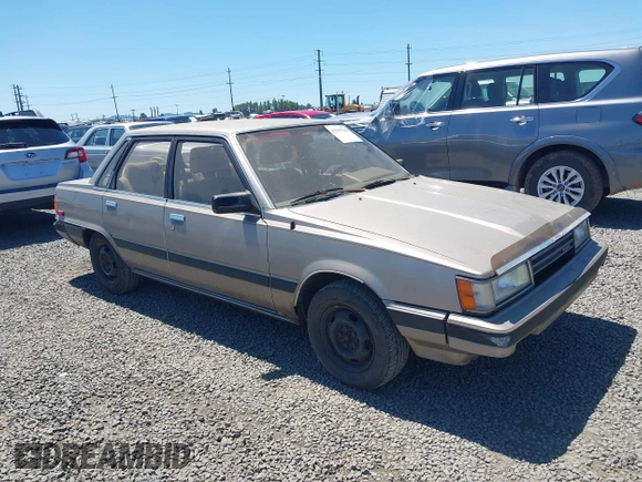 1986 Toyota Camry z VIN JT2SV16E1G0439200, wystawiony jako IAAI lot #42395141 z przebiegiem 159 698 mil mil oraz . Historia ofert i sprzedaży dostępna na DreamBid. Obrazek 1.