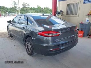 2019 Ford Fusion SE with VIN 3FA6P0HDXKR162353, listed as a IAAI auction lot 41970142 with 90,411 mi miles. Bid and sale history available at carsss.com. Image 3.