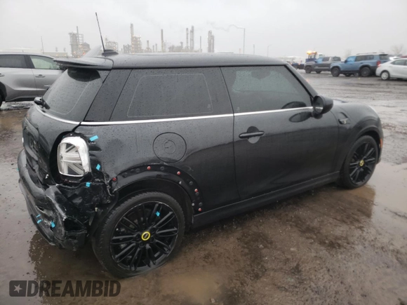 2023 MINI Hardtop Cooper SE z VIN WMW13DJ04P2U22804, wystawiony jako Copart lot #51372015 z przebiegiem 30 903 mil mil oraz Szkoda całkowita • Salvage title. Historia ofert i sprzedaży dostępna na DreamBid. Obrazek 3.