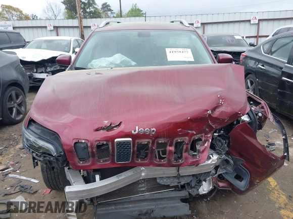 2019 Jeep Cherokee Latitude Plus with VIN 1C4PJLLB9KD434990, listed as a IAAI auction lot 41959477 with 96,283 mi miles and . Bid and sale history available at DreamBid. Image 12.