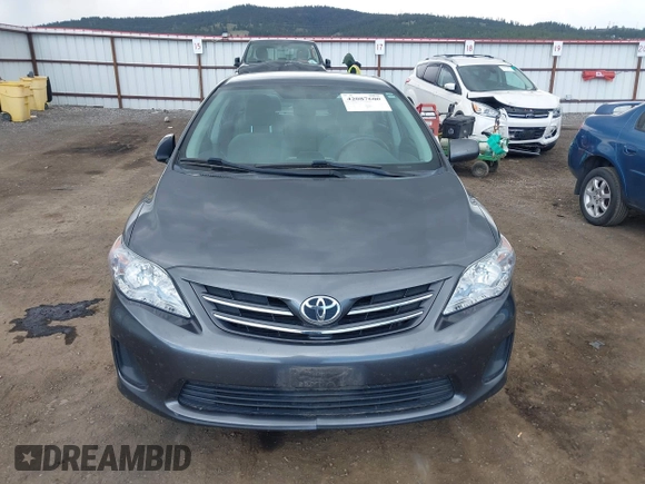2013 Toyota Corolla L with VIN 2T1BU4EE7DC102626, listed as a IAAI auction lot 42087600 with 84,977 mi miles. Bid and sale history available at carsss.com. Image 11.