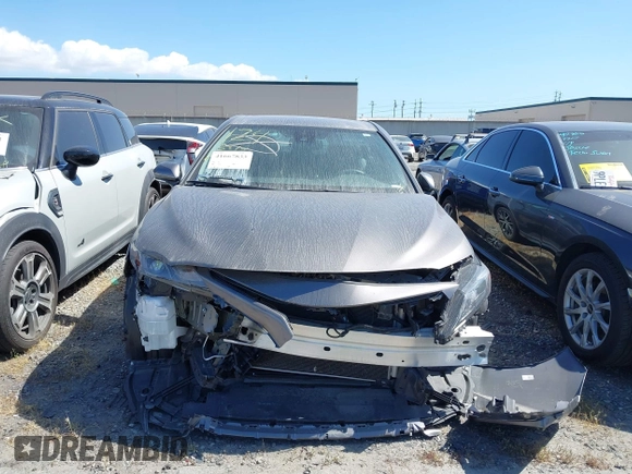 2022 Toyota Camry SE with VIN 4T1T11AKXNU683921, listed as a IAAI auction lot 41667833 with 26,578 mi miles and . Bid and sale history available at DreamBid. Image 12.