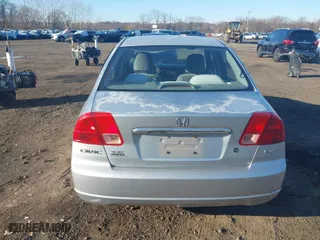 2002 Honda Civic LX with VIN 2HGES16602H581131, listed as a IAAI auction lot 40993388 with 116,663 mi miles. Bid and sale history available at carsss.com. Image 16.