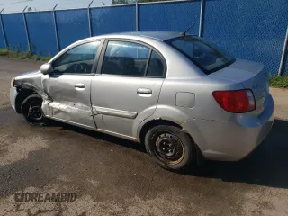 2011 Kia Rio with VIN KNADH4B32B6915275, listed as a Copart auction lot 71546484 with 297,998 mi miles and Salvage Title. Bid and sale history available at DreamBid. Image 2.